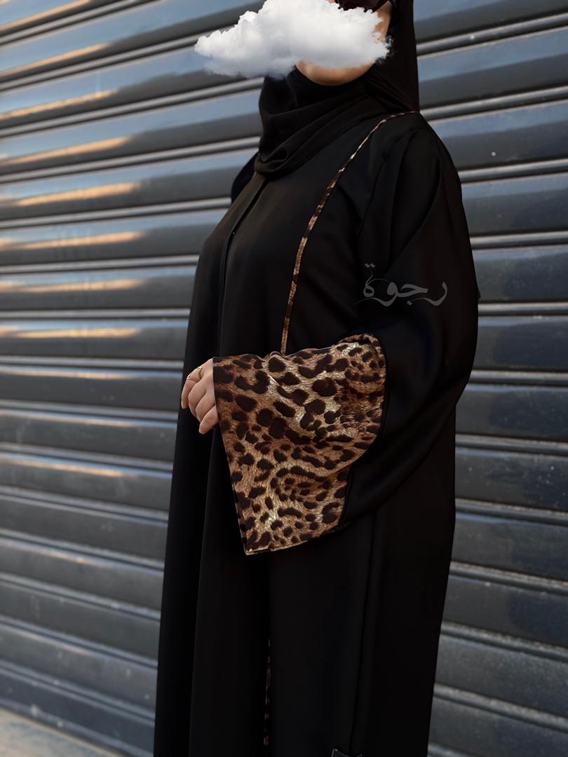 عباءة سوداء مع اضافة بالنمري