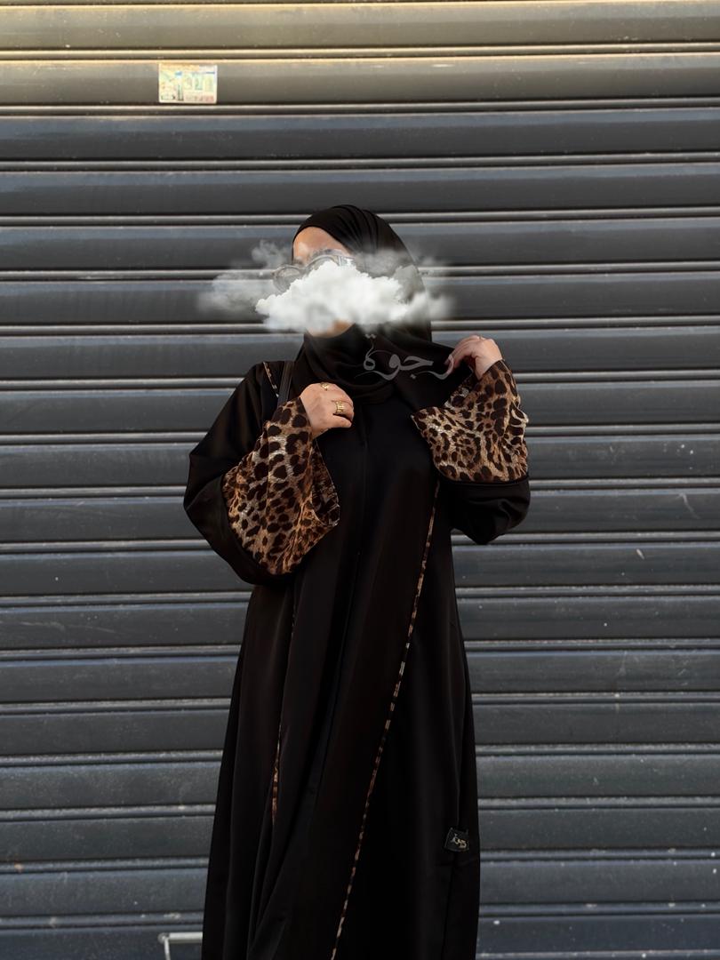 عباءة سوداء مع اضافة بالنمري
